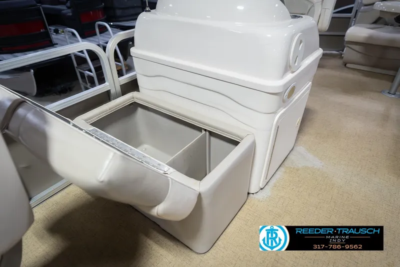 Slide: The Image of 2009 Sylvan 818 Mirage Fish boat interior with open storage compartment. - 23