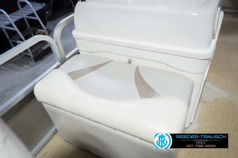 Slide: The Image of White seating on 2009 Sylvan 818 Mirage Fish boat, Reeder-Trausch Marine logo visible. - 41