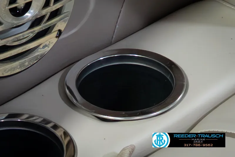 Slide: The Image of Cup holder in 2009 Sylvan 818 Mirage Fish boat interior, featuring sleek design. - 44