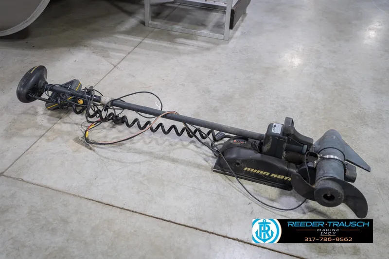 Slide: The Image of Minn Kota trolling motor on floor, suitable for 2009 Sylvan 818 Mirage Fish boat. - 50