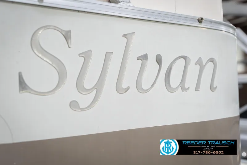 Slide: The Image of 2009 Sylvan 818 Mirage Fish boat with logo, Reeder-Trausch Marine contact. - 56