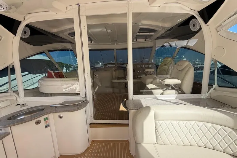 Slide: The Image of Luxurious interior of a 2006 Sea Ray 48 Sundancer yacht with elegant seating and helm. - 30