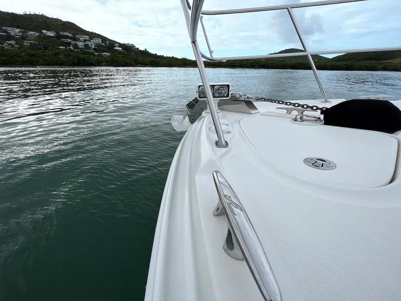 Slide: The Image of Sea Ray 48 Sundancer 2006 on calm waters with coastal view. - 40