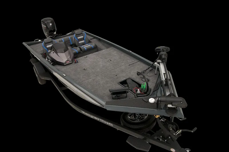 Slide: The Image of 2026 Ranger RT188 boat interior with open storage compartment, featuring gray carpeting and red trim. - 18