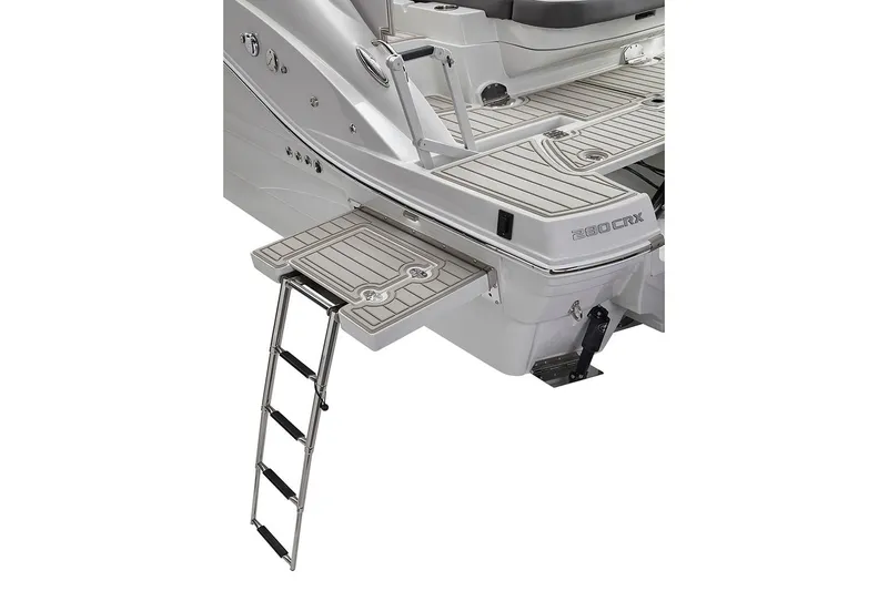 Slide: The Image of 2026 Crownline 280 CRX boat on trailer, featuring sleek design and Mercury outboard engine. - 2