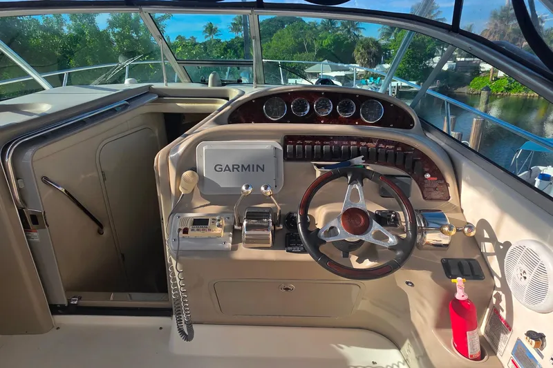 Slide: The Image of Control panel of a 2006 Sea Ray 290 Amberjack boat with audio system display. - 17