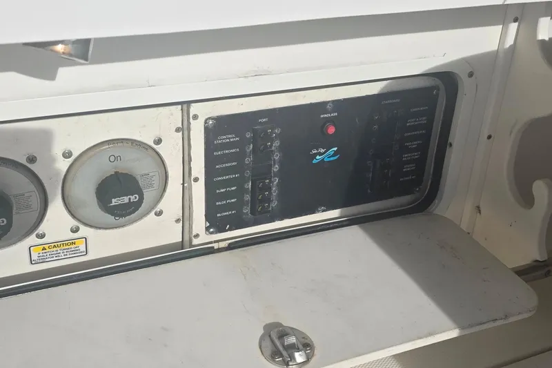 Slide: The Image of Interior of 2006 Sea Ray 290 Amberjack with TV, seating, and table. - 22