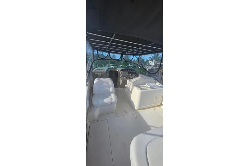 Slide: The Image of Bathroom interior of 2006 Sea Ray 290 Amberjack boat with sink and porthole. - 25