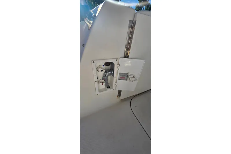 Slide: The Image of 2006 Sea Ray 290 Amberjack boat with spacious deck and seating, viewed from above. - 6