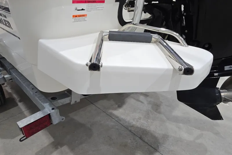 Slide: The Image of 2014 Boston Whaler 170 Montauk swim platform with ladder, on trailer. - 16
