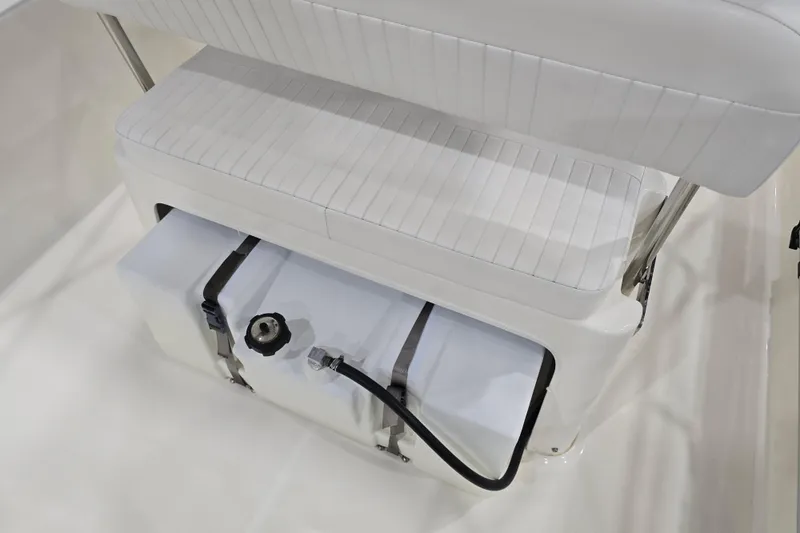 Slide: The Image of 2014 Boston Whaler 170 Montauk boat seat with storage compartment and fuel tank. - 41