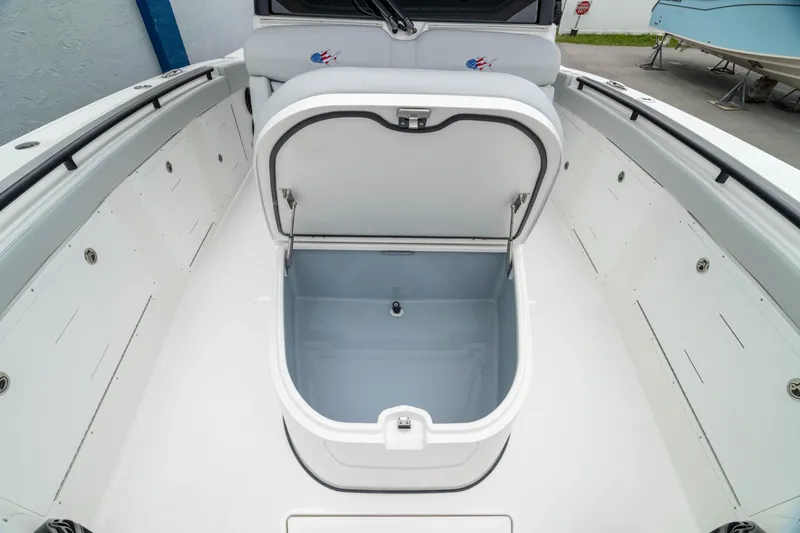 Slide: The Image of Open storage compartment on 2026 Crevalle 33 CSF boat deck. - 14