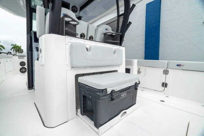 Slide: The Image of 2026 Crevalle 33 CSF boat interior with seating and storage area. - 27