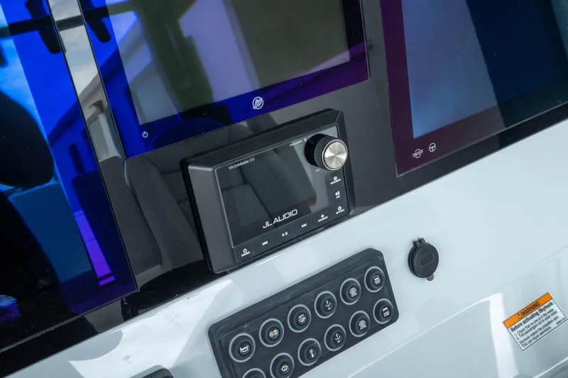 Slide: The Image of Control panel of 2026 Crevalle 33 CSF boat with JL Audio system. - 39