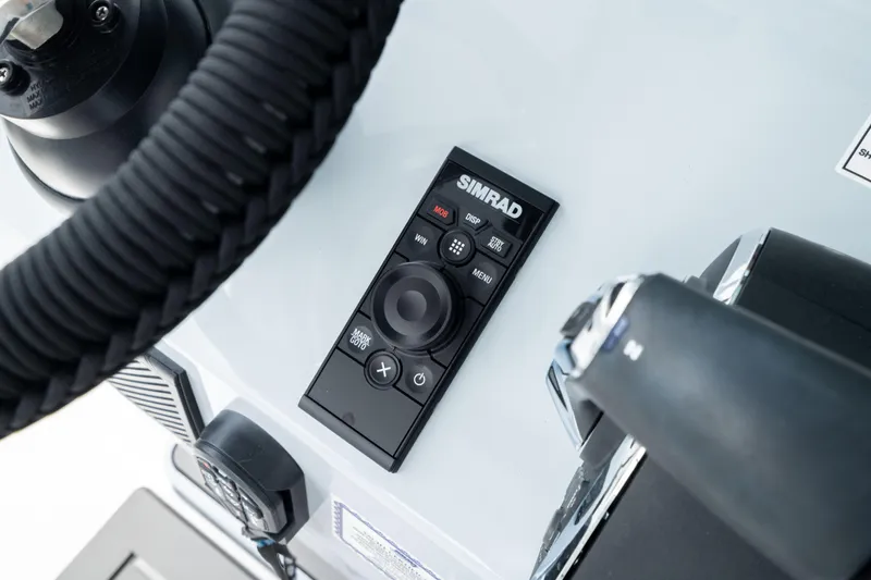 Slide: The Image of Steering console of 2026 Crevalle 33 CSF with Simrad control panel. - 47