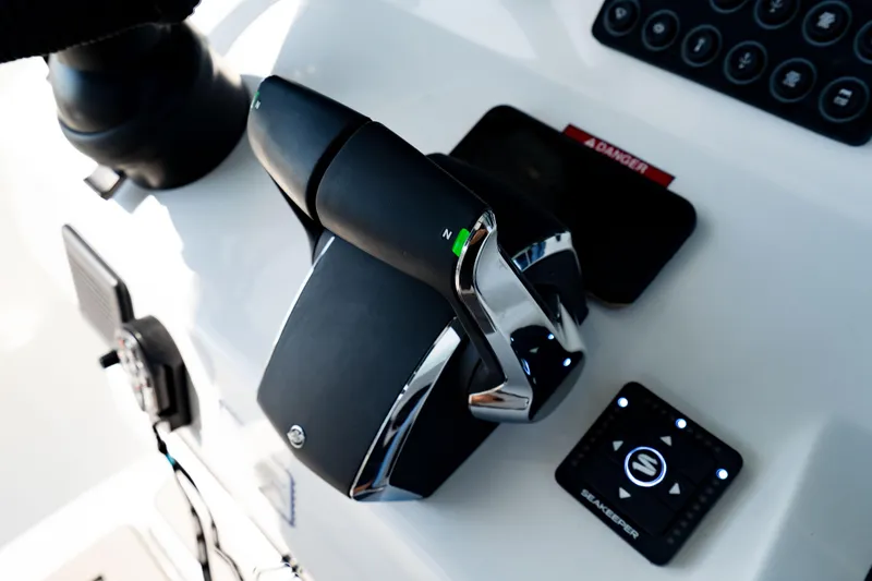 Slide: The Image of Control panel of 2026 Crevalle 33 CSF boat with throttle and Seakeeper system. - 23