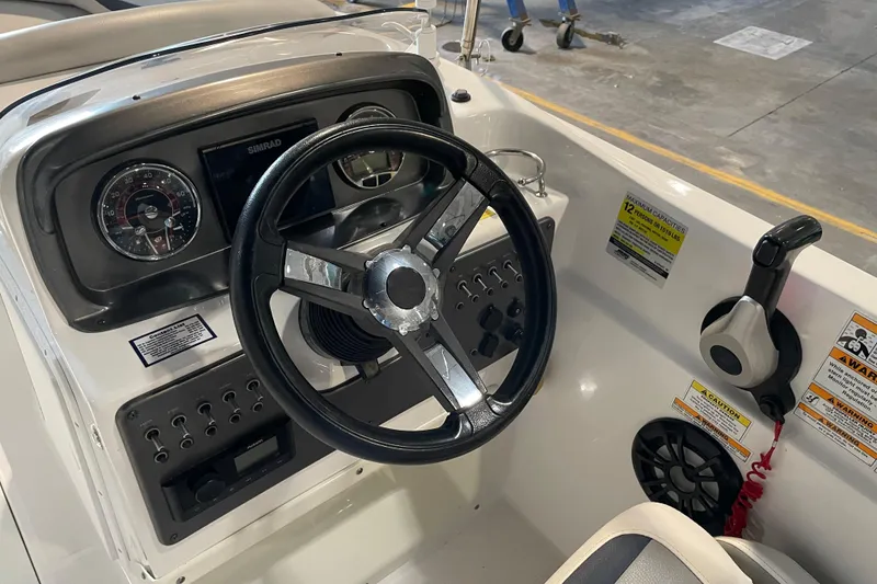 Slide: The Image of Dashboard of 2023 Hurricane SunDeck Sport 201 OB with Yamaha and Garmin instruments. - 23
