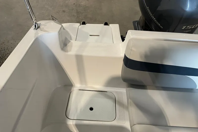 Slide: The Image of Trailer for 2023 Hurricane SunDeck Sport 201 OB boat in parking lot. - 28