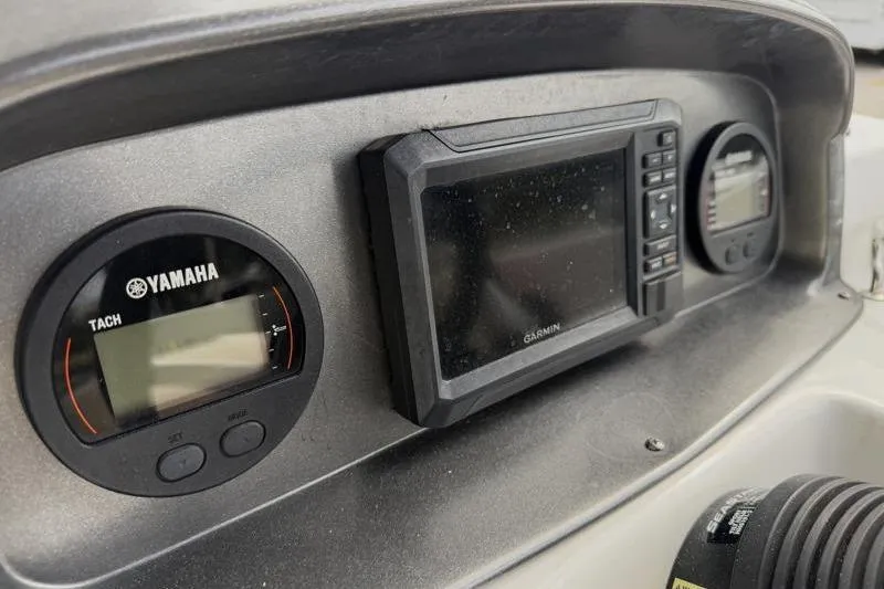 Slide: The Image of Dashboard of 2023 Hurricane SunDeck Sport 201 OB with Yamaha and Garmin instruments. - 51