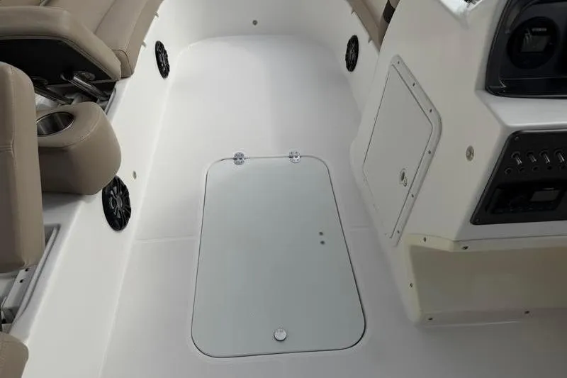 Slide: The Image of 2023 Hurricane SunDeck Sport 201 OB interior with seating and control panel. - 55