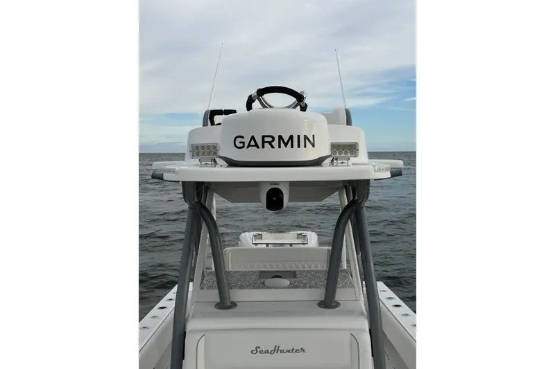 Slide: The Image of 2024 SeaHunter 28 Floridian boat with Garmin equipment on open water. - 20