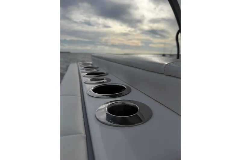 Slide: The Image of 2024 SeaHunter 28 Floridian boat with stainless steel cup holders, ocean view. - 31