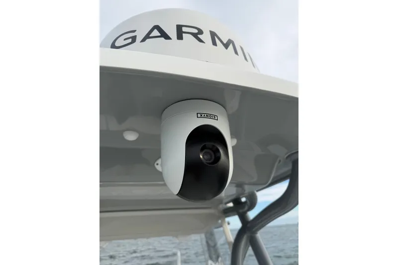 Slide: The Image of 2024 SeaHunter 28 Floridian boat with Garmin radar and mounted camera. - 35