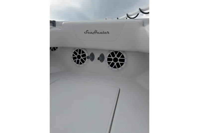 Slide: The Image of 2024 SeaHunter 28 Floridian boat interior with speakers and logo detail. - 36