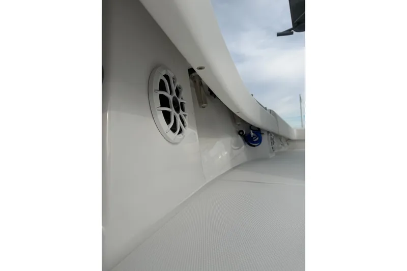 Slide: The Image of 2024 SeaHunter 28 Floridian boat interior with speaker detail, showcasing sleek design. - 37