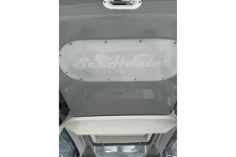 Slide: The Image of 2024 SeaHunter 28 Floridian boat, featuring sleek gray design and logo detail. - 45