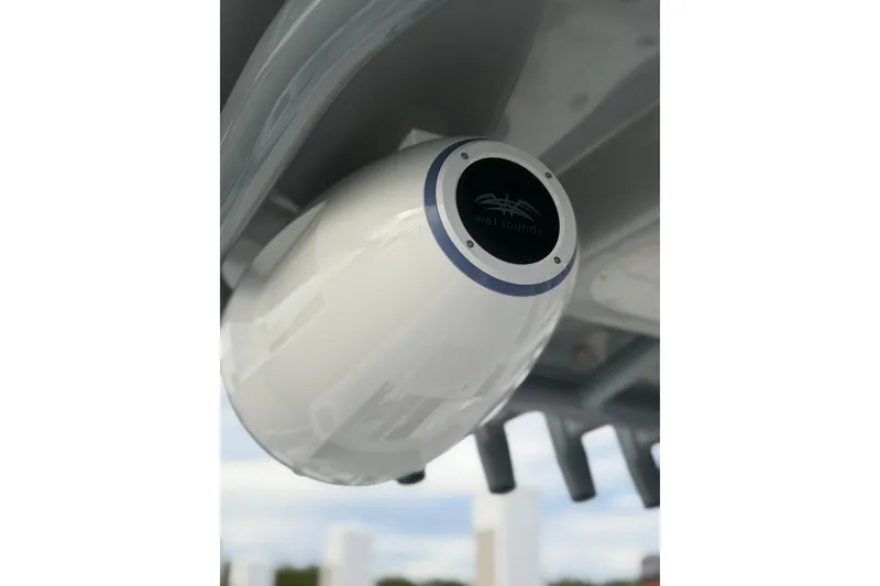 Slide: The Image of 2024 SeaHunter 28 Floridian boat speaker, Wet Sounds, mounted under the deck. - 52
