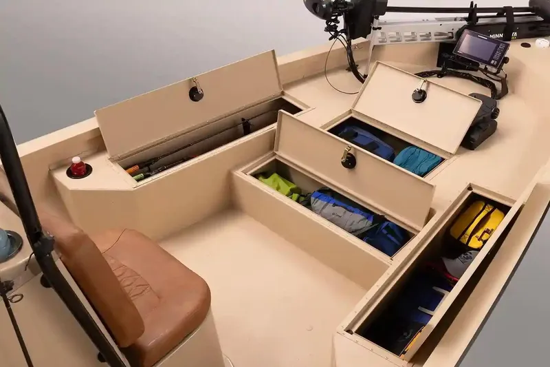 Slide: The Image of Manufacturer Provided Image: 2026 G3 Bay 21 GX boat interior with open storage compartments and fishing gear. - 3