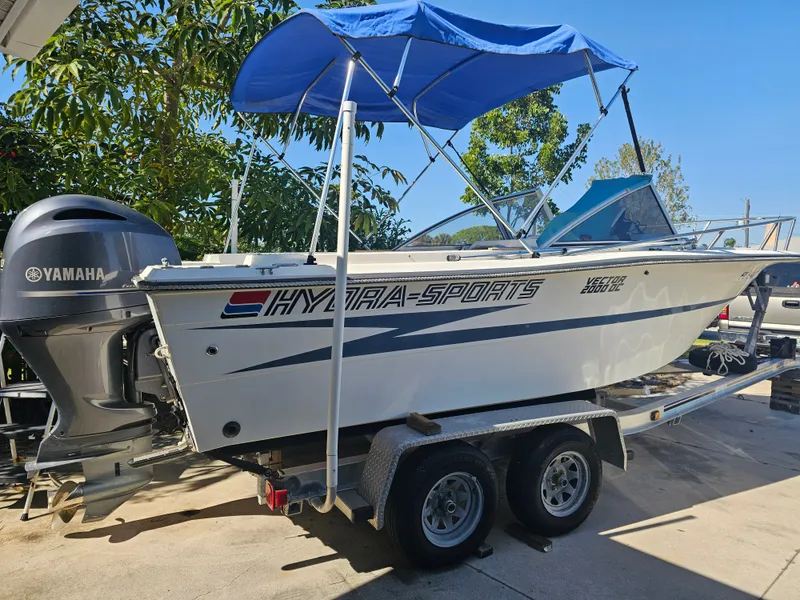 The Image of 1990 Hydra-Sports 2000 DC boat with Yamaha engine on trailer. - 0