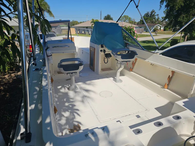 Slide: The Image of 1990 Hydra-Sports 2000 DC boat interior with seating. - 3