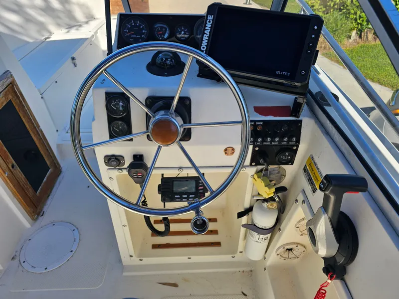 Slide: The Image of Steering console of a 1990 Hydra-Sports 2000 DC boat. - 4
