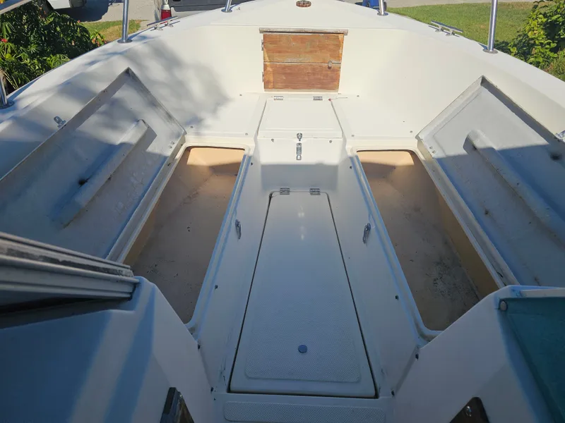 Slide: The Image of Interior of a 1990 Hydra-Sports 2000 DC boat with storage compartments. - 8