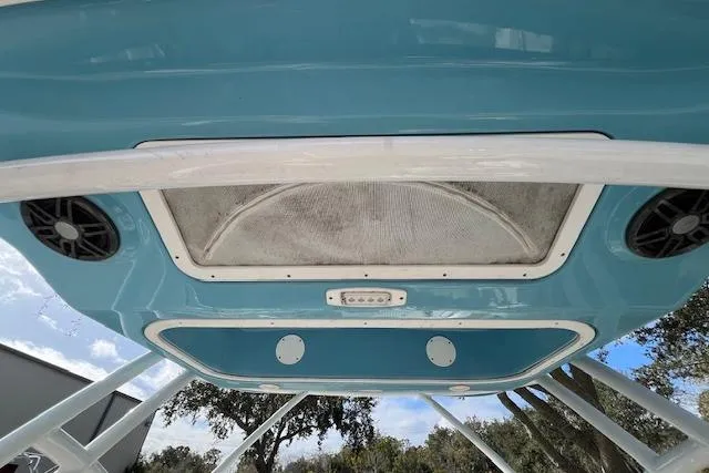 Slide: The Image of 2021 Sea Fox 226 Traveler boat roof with speakers and blue accents. - 12
