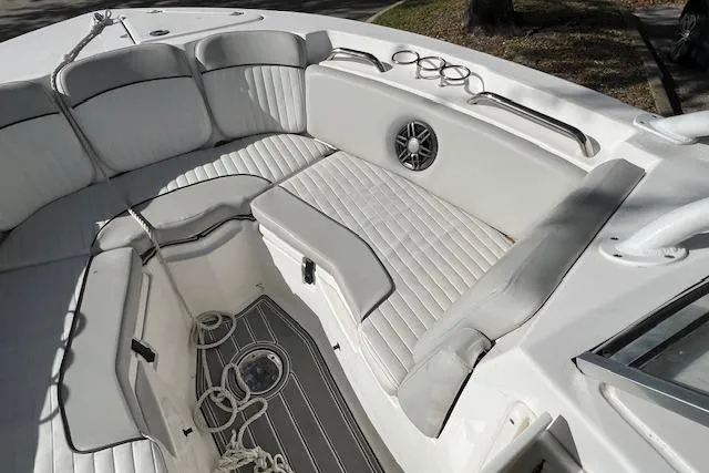 Slide: The Image of 2021 Sea Fox 226 Traveler boat interior with cushioned seating and speaker system. - 9