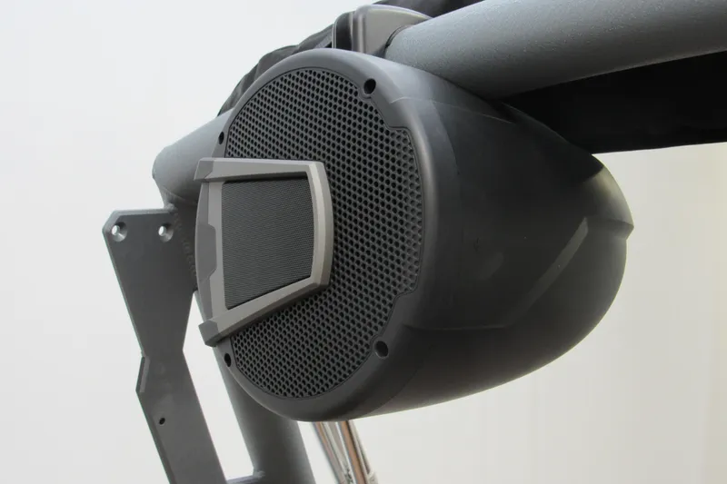 Slide: The Image of Close-up of Axis A225 speaker, 2026 model, mounted on a metal frame. - 10