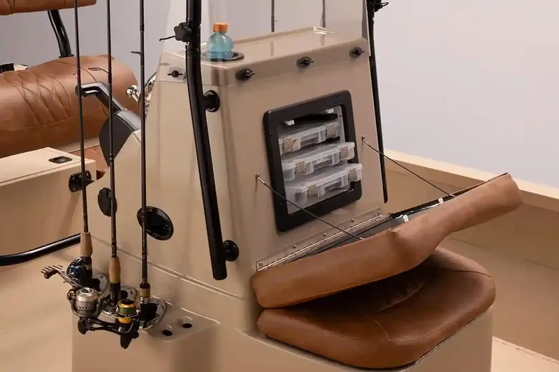 Slide: The Image of Manufacturer Provided Image: 2026 G3 Bay 21 GX boat interior with fishing rod holders and tackle storage. - 4