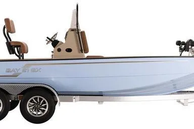 Slide: The Image of 2026 G3 Bay 21 GX boat on trailer, side view, light blue color. - 7