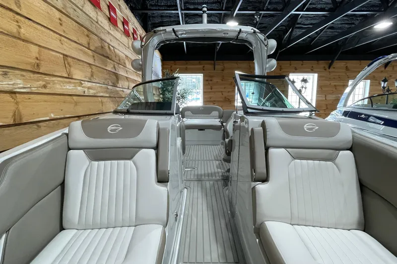 Slide: The Image of 2026 Crownline 298 SS boat interior with luxurious seating and modern design. - 10