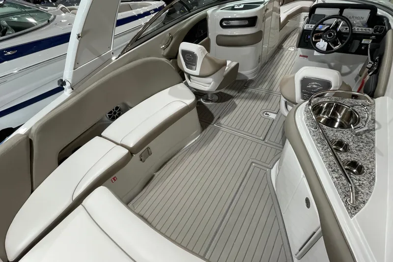 Slide: The Image of Luxurious interior of 2026 Crownline 298 SS boat with elegant seating and modern amenities. - 6