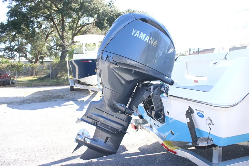 Slide: The Image of 2026 Tidewater 210 LXF boat with Yamaha outboard motor on trailer. - 15