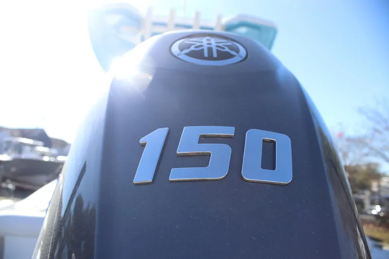 Slide: The Image of Close-up of a Yamaha 150 outboard motor on a 2026 Tidewater 210 LXF boat. - 17