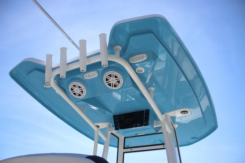 Slide: The Image of 2026 Tidewater 210 LXF boat top view with speakers and rod holders. - 28