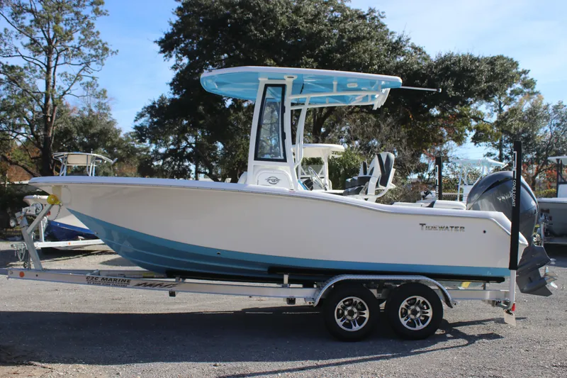 Slide: The Image of 2026 Tidewater 210 LXF boat on trailer, featuring sleek design and modern features. - 7
