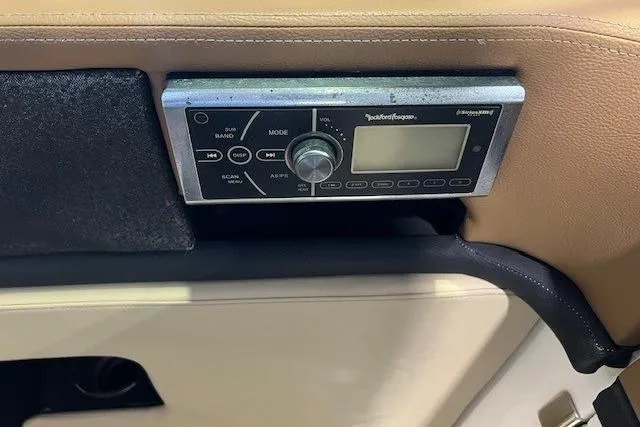 Slide: The Image of Control panel of a 2016 Sea Ray 250 SLX boat with Rockford Fosgate audio system. - 17