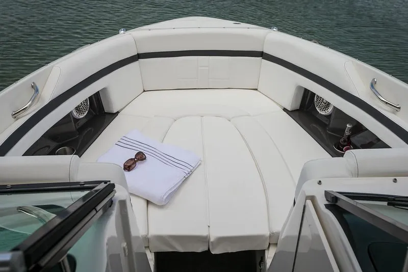 Slide: The Image of Manufacturer Provided Image: 2015 Sea Ray 250 SLX boat with white cushioned seating and accessories. - 29