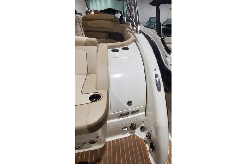 Slide: The Image of 2017 Formula 350 Crossover Bowrider interior with beige seating and sleek design. - 12